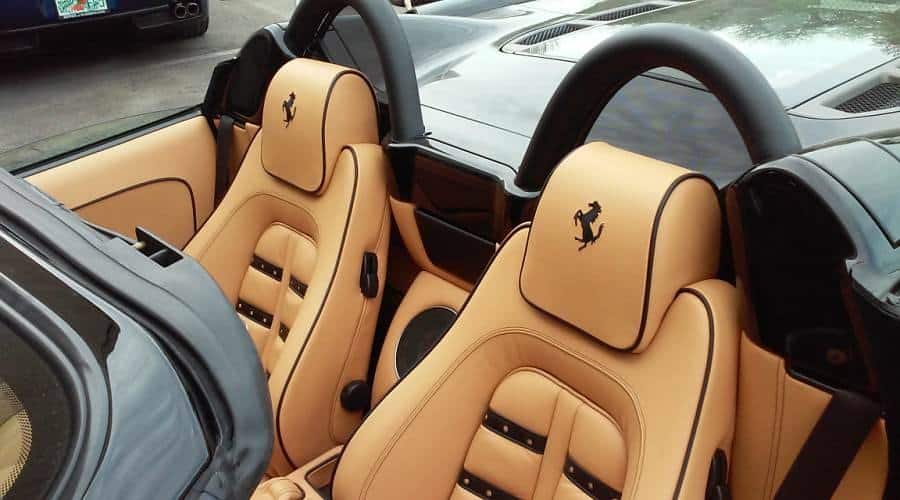 The Black Embroidered Ferrari Logo In The Headrests Ties The Whole Interior Together. 